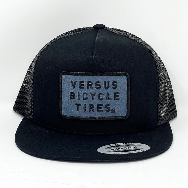 Versus Patch Trucker Hat