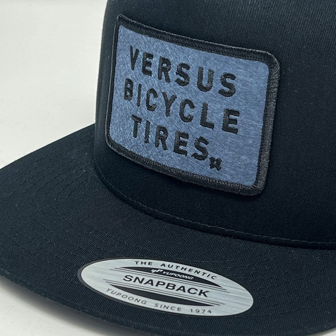 Versus Patch Trucker Hat