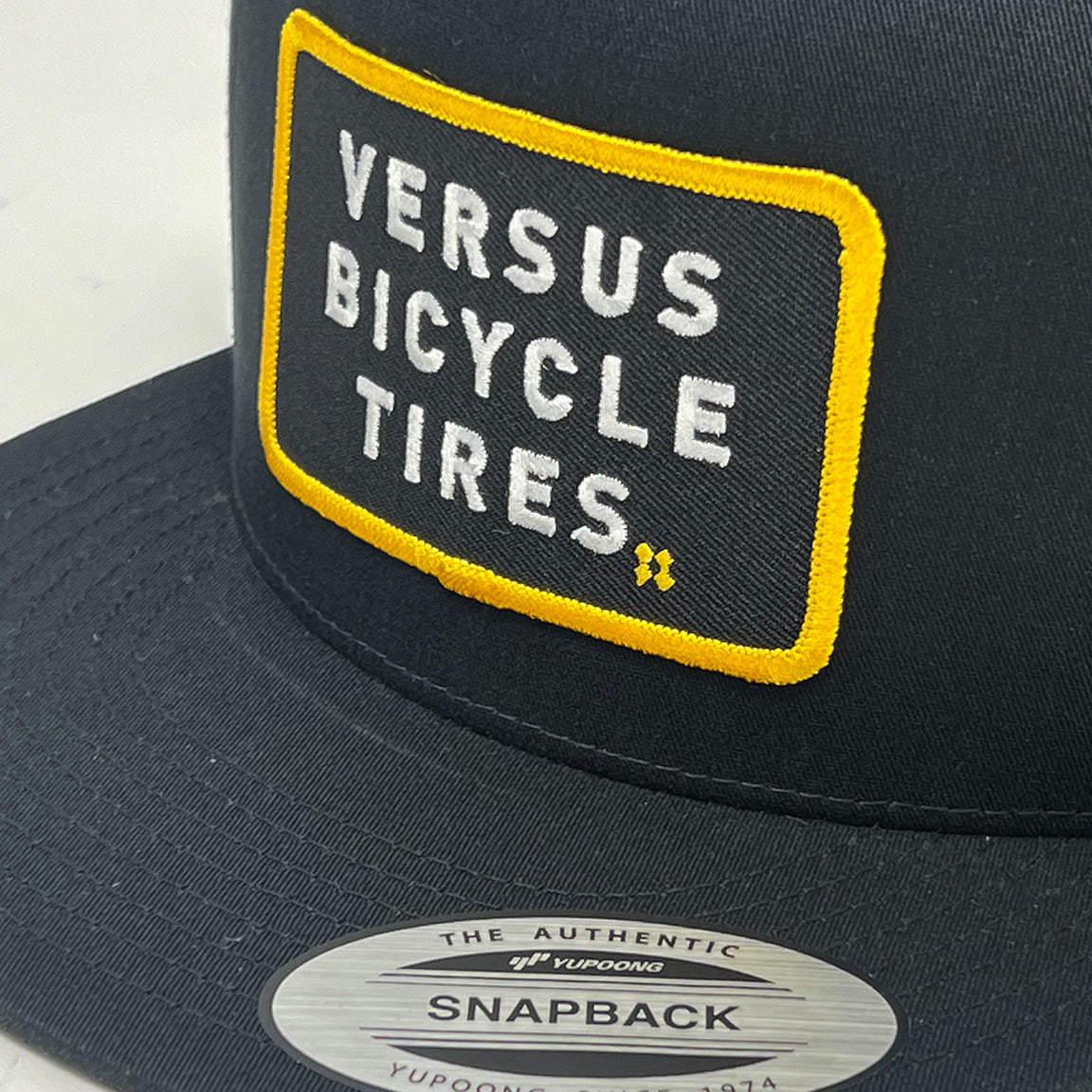 Versus Patch Trucker Hat