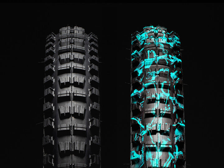 Black & Blue Splatter Versus All-Mountain bicycle tires